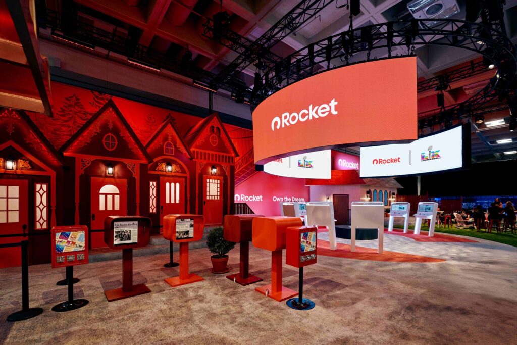 red mailboxes beside Rocket Mortgage's booth at Super Bowl Fan Experience