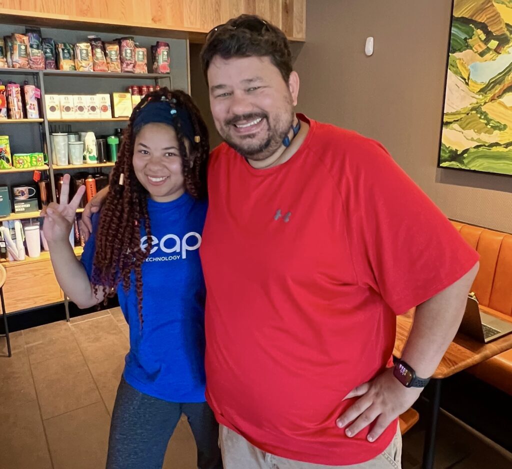 two members of the client services team getting together