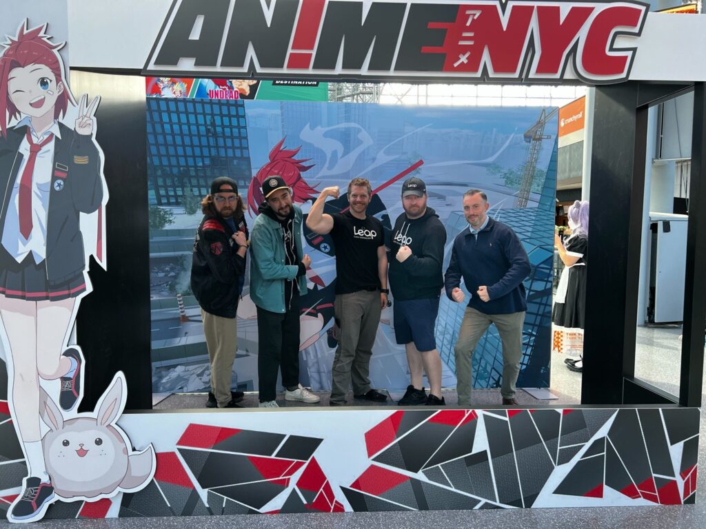 five Leap team members posing at Anime NYC