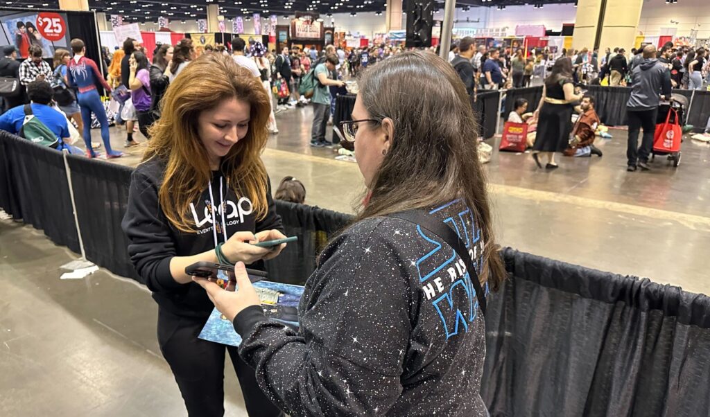 leap team member scanning a fan's ticket