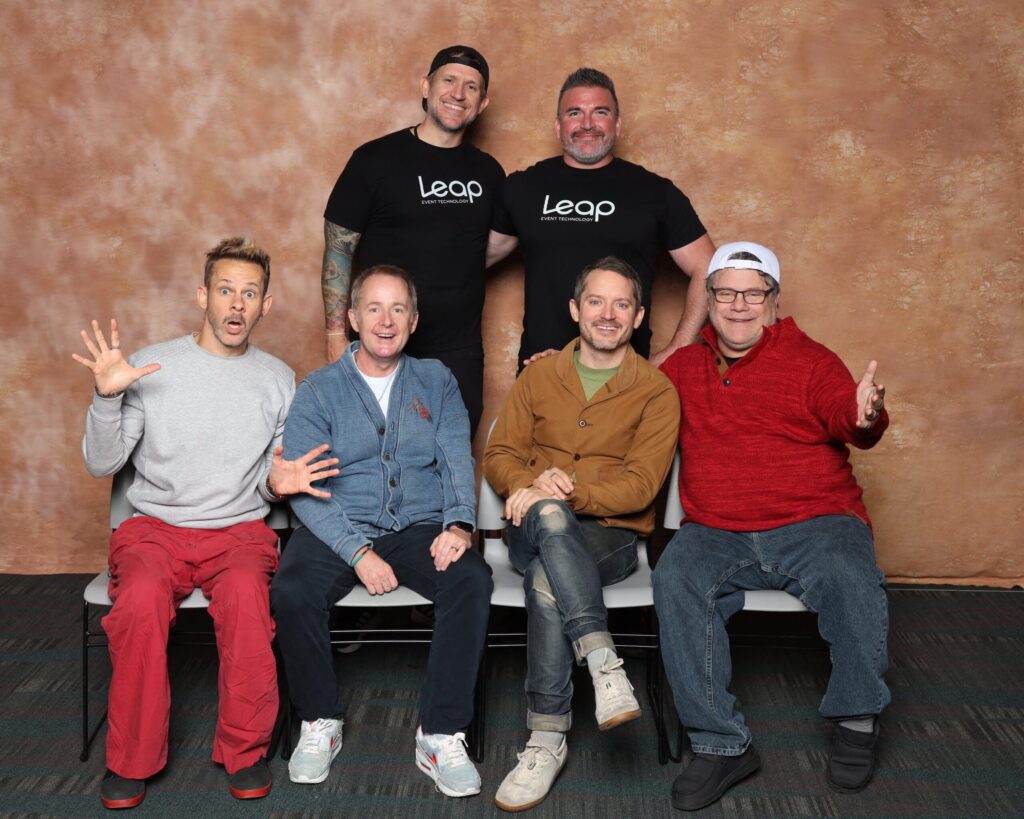 Leap Event Technology employees posing at a celebrity photo op