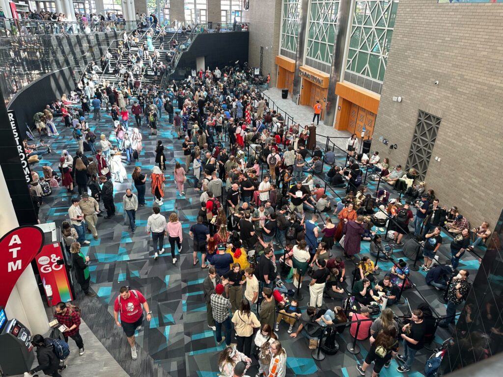 crowded floor of attendees at a convention