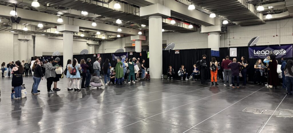 attendees lining up for a celebrity photo op experience