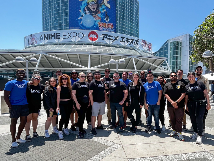 Leap Event Technology team members posing in front of Anime Expo