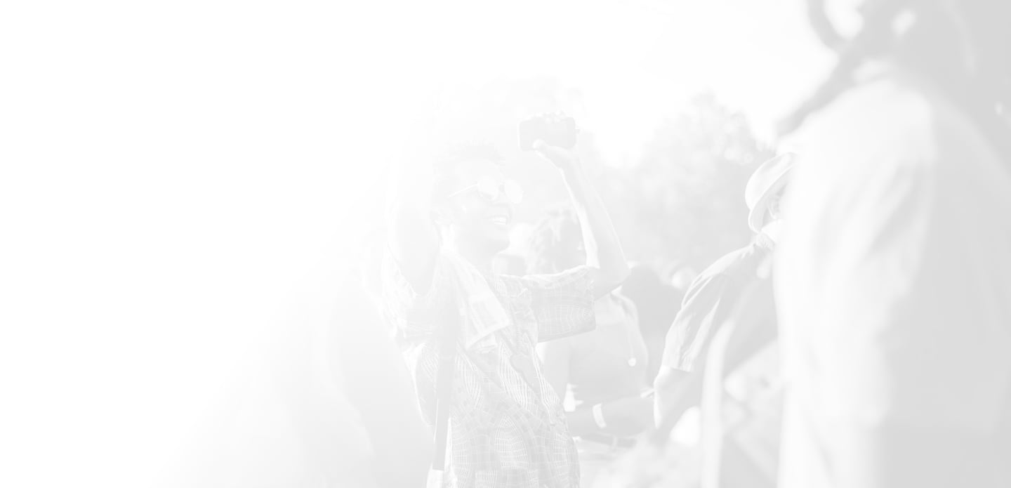 Faded illustration of people enjoying a festival