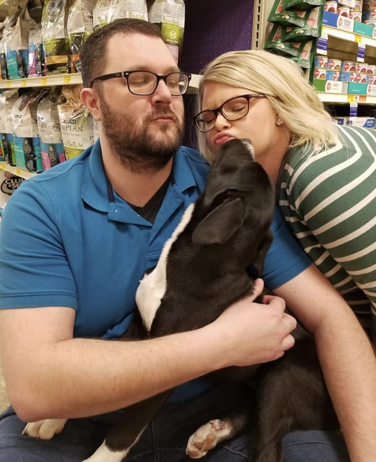 Andrew with his wife and newly adopted dog