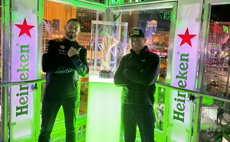 joe and mike at live event with neon green lights